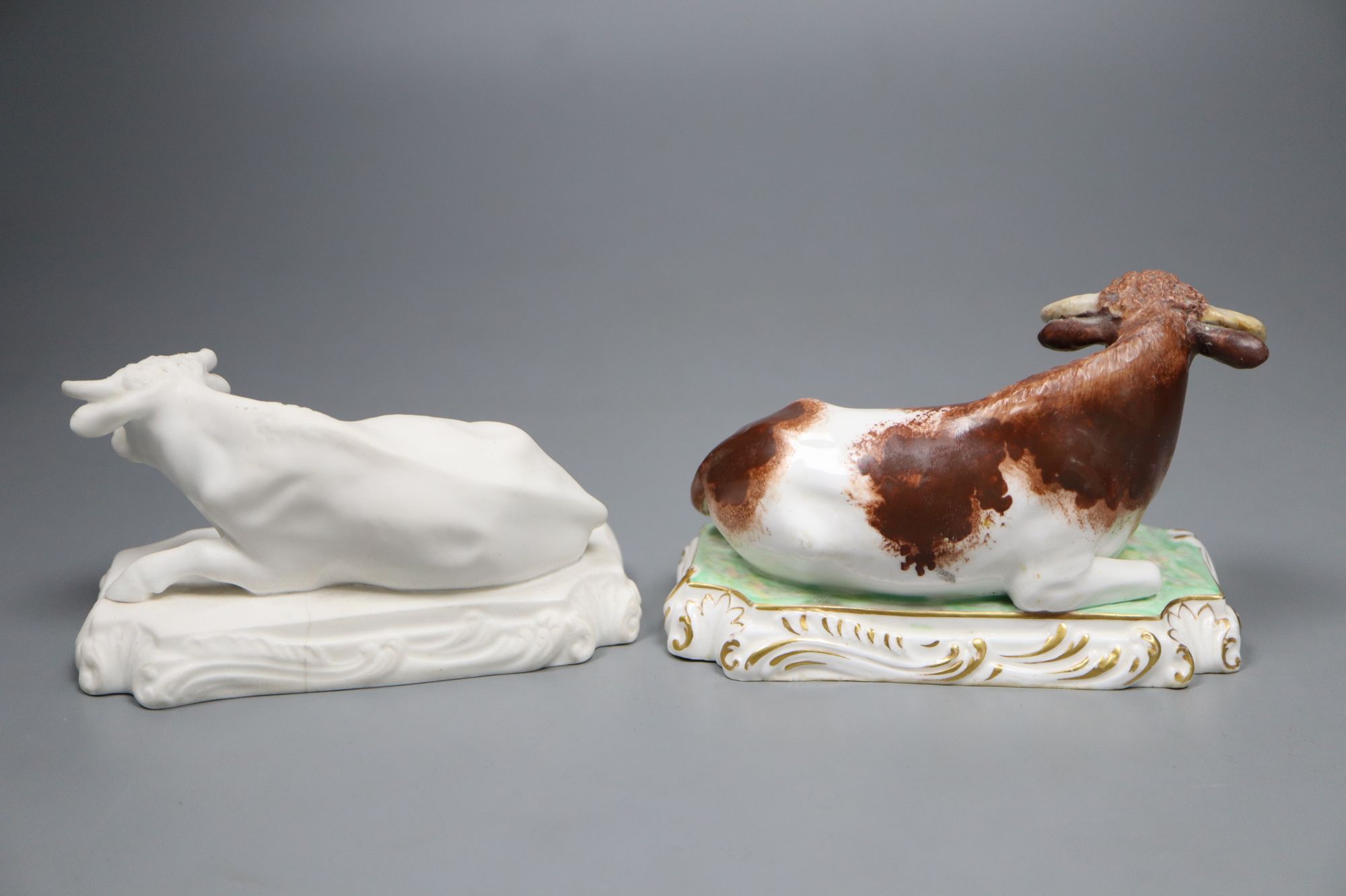 Two rare Copeland & Garrett porcelain recumbent figures of bulls, c.1833-47, 12.5cm long,
